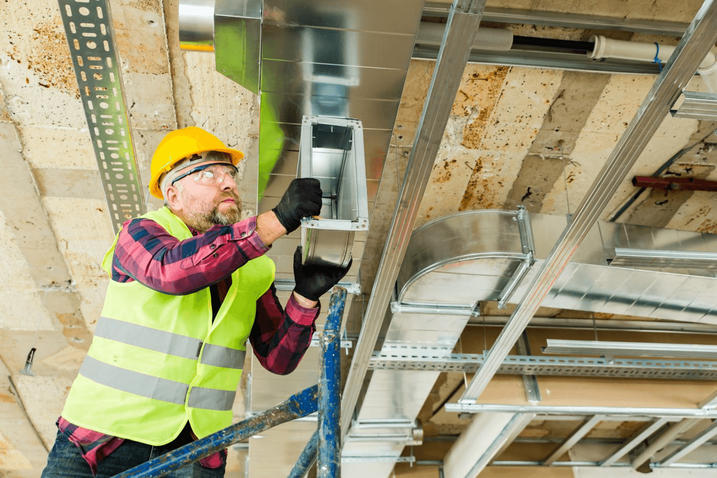 Commercial electrical contractors installing conduit and systems on a Houston build